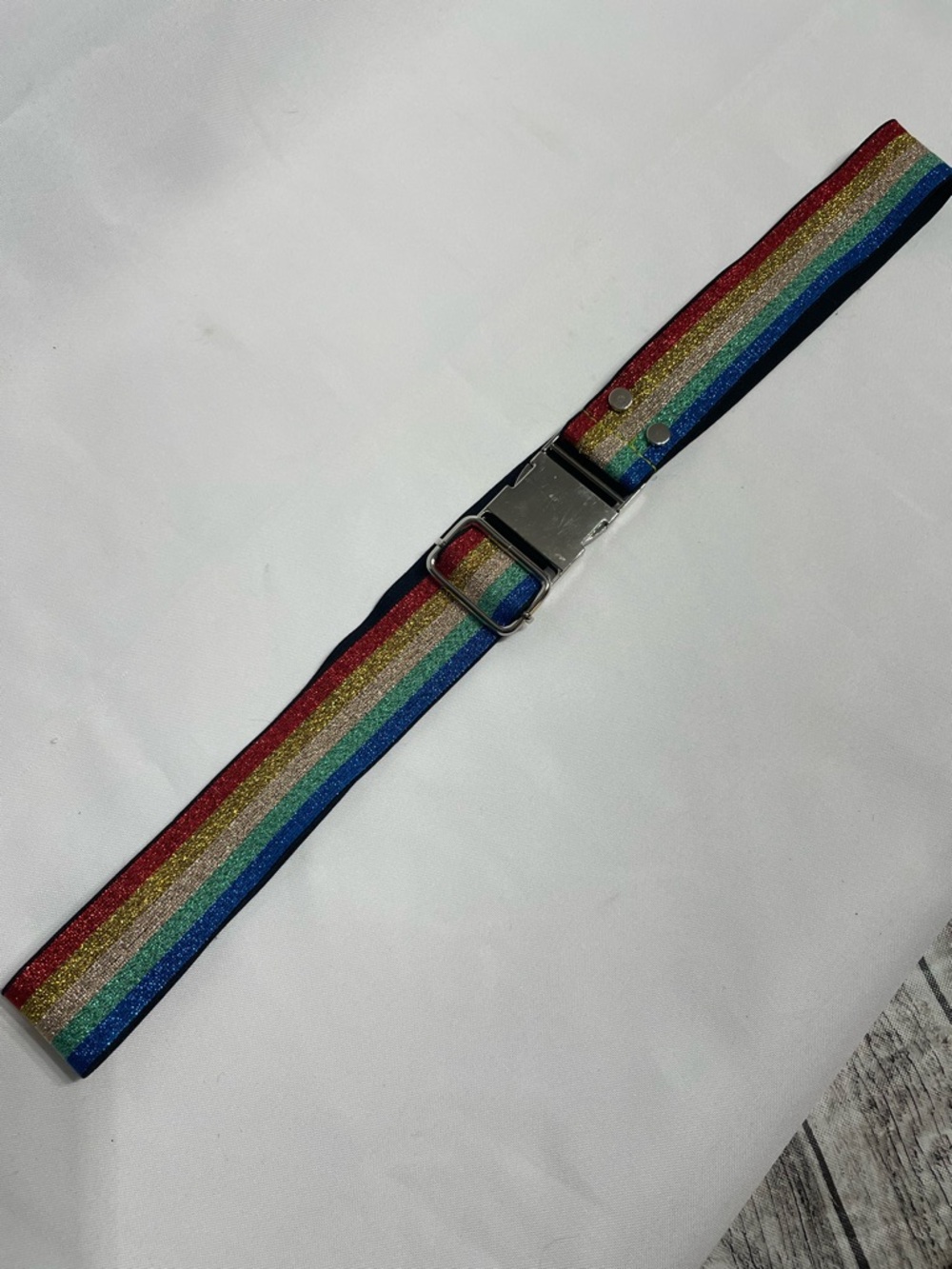 One size fits most elastic Rainbow belt excellent condition very stretchy